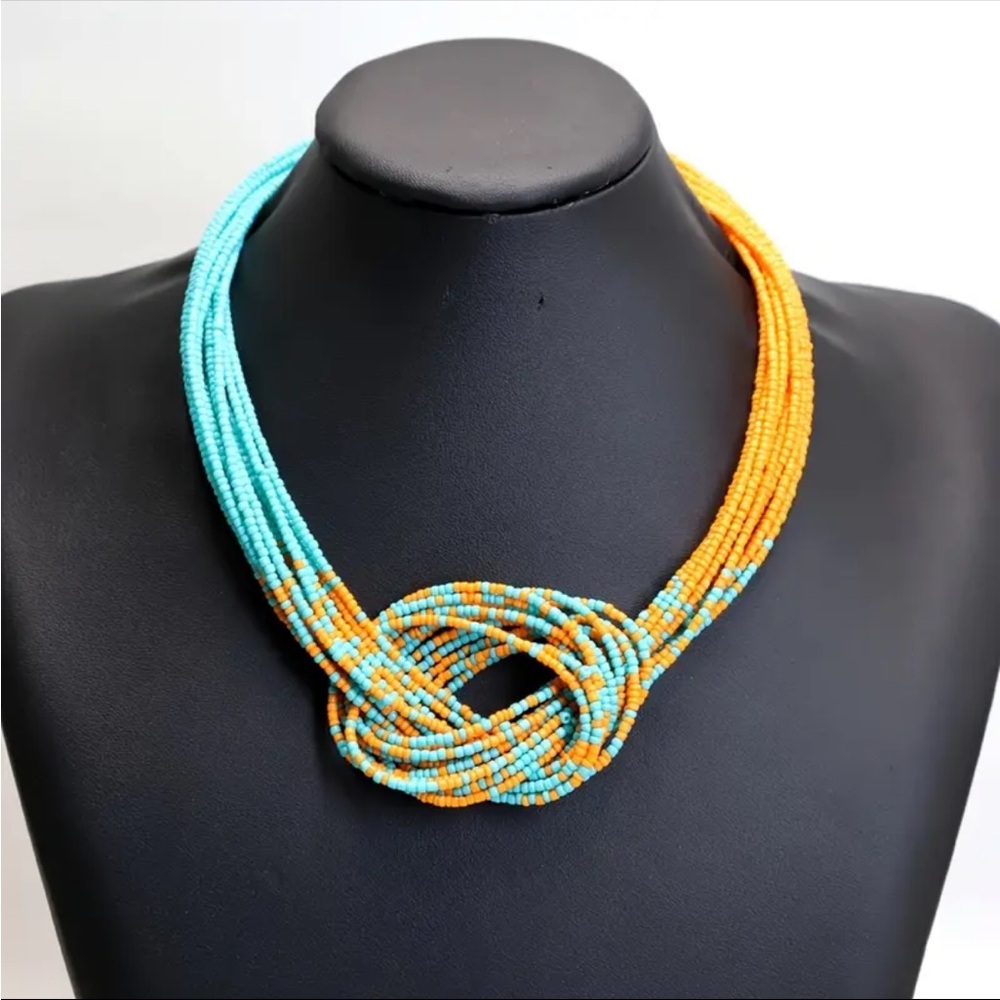 Blue and Orange Knot Necklace with Intricate Design